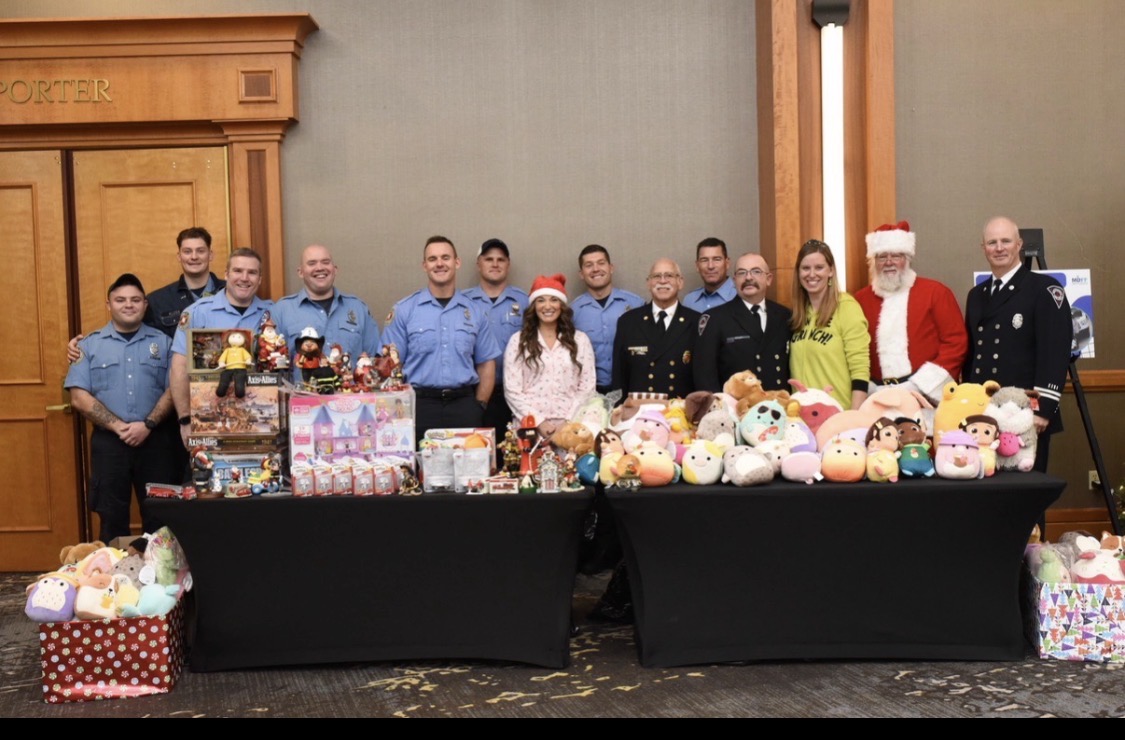 First responders and community members at a holiday toy drive