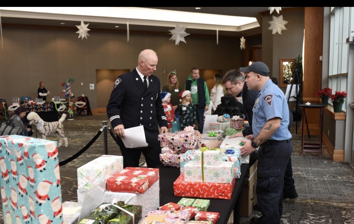 First responders organizing gifts for children