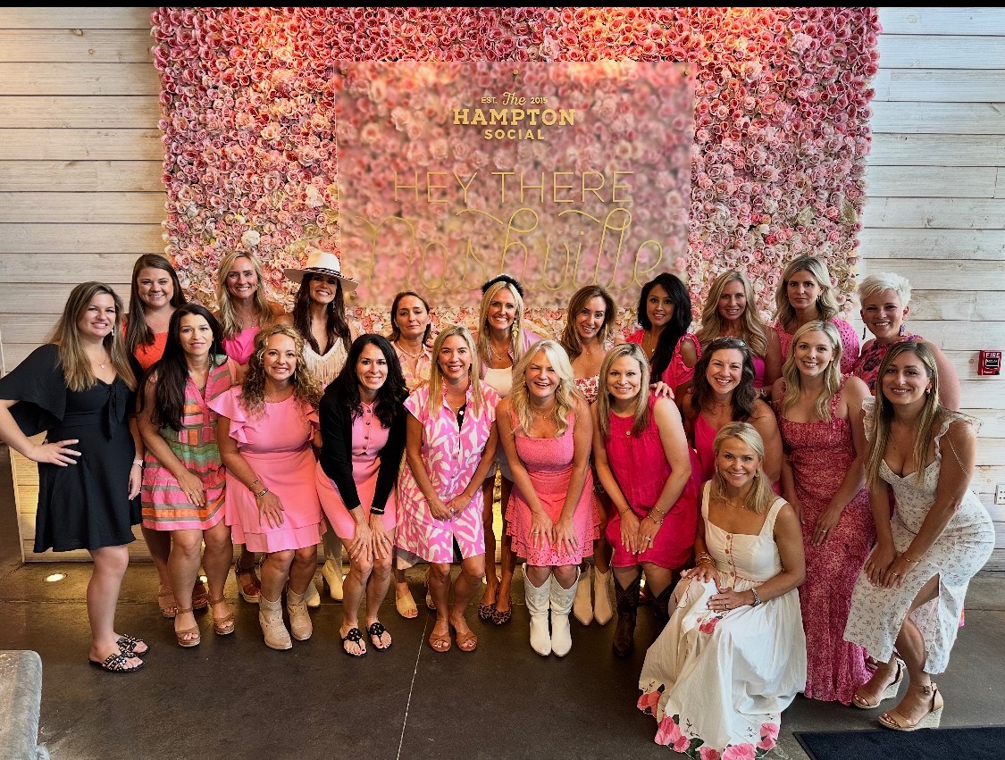 Women of the Orange Heart Collective at a group event